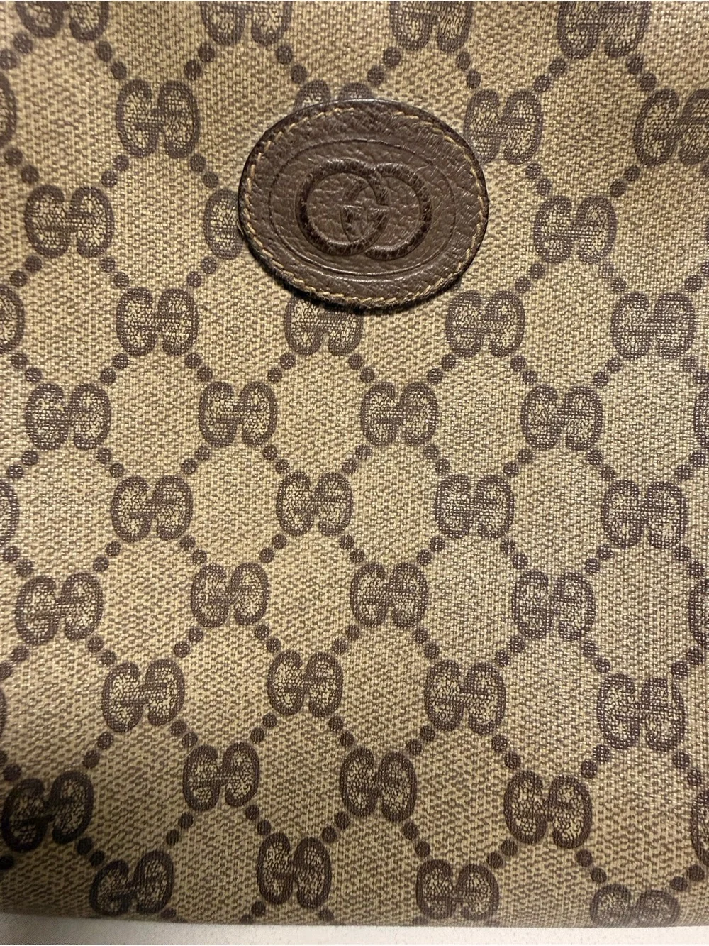Gucci Gold-Tone Logo Plate on Dark Brown Leather